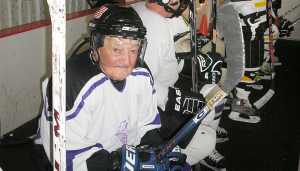 Members of the Gray Wolves Senior Hockey club waiting to play at Cicero Twin Rinks in Cicero. Shown on the left is Dick “D.D.” Lynch, an 89-year-old player.