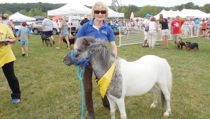TV personality Laura Hand next to a pony during an event last year. She rides horses on a regular basis, nearly every day — even in the winter.