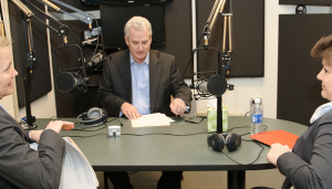 Grant Reeher, the host of Campbell Conversations, with Onondaga County Joanie Mahoney and former Syracuse Mayor Stephanie Miner discussing the disagreement between the city and the county over the Inner Harbor development. Photo provided.