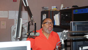 George Kilpatrick at the booth at IHeartRadio in Syracuse during a recent broadcast of his radio program. 