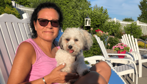 Maryann Roefaro holding her poodle, Millie. She recently published a new book that deals with everything from life, death and families. Roefaro is the CEO of Hematology/Oncology Associates of Central New York.