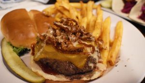 The Bees burger ($11) at Anfry Garlic. It’s served with jalapeños, cheddar cheese, fried onions and honey garlic barbecue sauce.