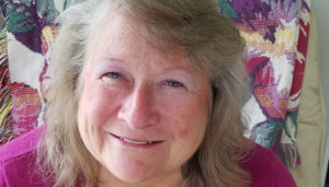 Barbara Raymond-LaPrease serves as secretary for the Woodworkers of Central New York, Inc. She demonstrates a Pegas Precisions Scroll Saw at the New York Farm Show. Photo by Deborah Jeanne Sergeant.