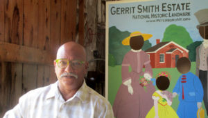 Max Smith inside the barn at the Gerrit Smith Estate in Peterboro; the estate is part of the National Historic Site that tells the story of abolitionist work during the 1800s. Photo by Debra J. Groom.