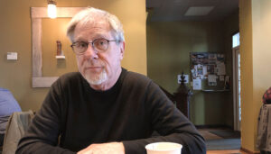 Author Paul Kocak at Salt City Coffee on West Onondaga Street in Syracuse. He has published three books this year.