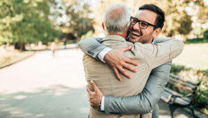 Father and son hugging